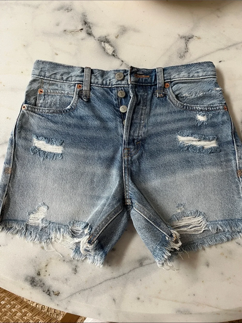 Free People distressed denim shorts